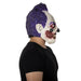 Máscara de látex de payaso de terror con pelo morado y rostro desgarrado (vista 2)