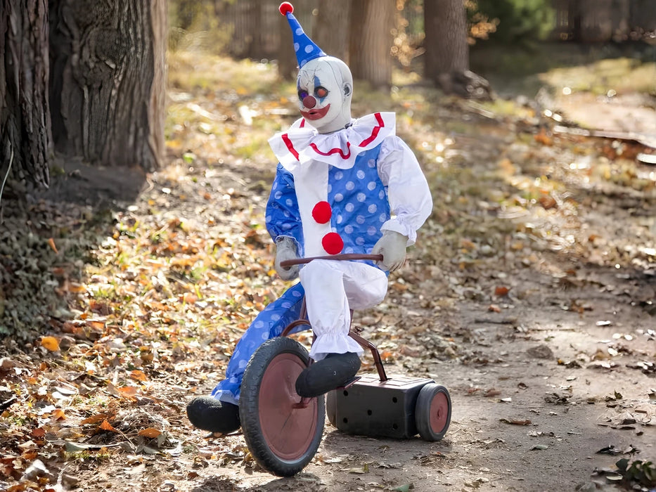 Animatronic payaso en triciclo de 81 cm con traje azul de lunares blancos y gorro azul