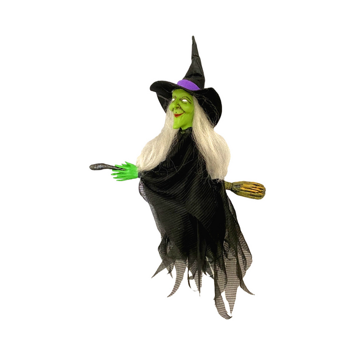 Bruja voladora colgante de cara verde con pelo blanco, sombrero negro y escoba