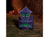 Decoración de Halloween casa embrujada morada con ventanas verdes