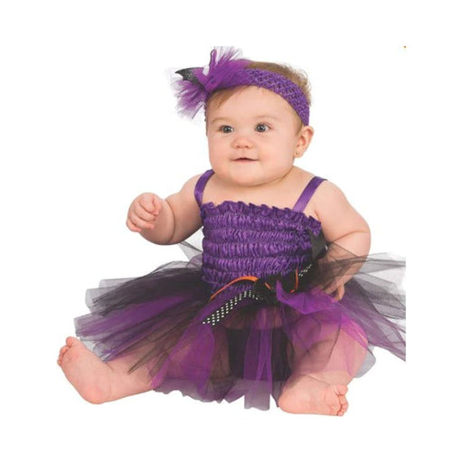 Bebé con disfraz de murciélago, vestido tutú morado y negro y diadema morada con alas de murciélago