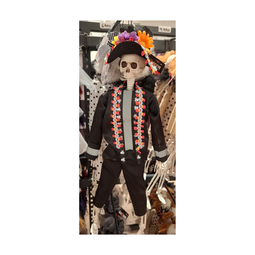 Esqueleto Catrina de 40 cm con sombrero negro con flores y traje negro con cintas de colores, foto real en tienda