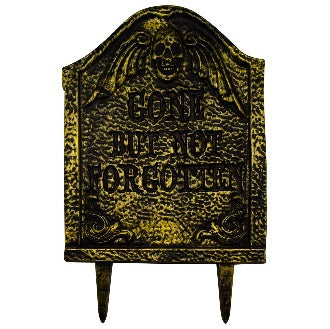 Lápida decorativa dorada envejecida con calavera y estacas