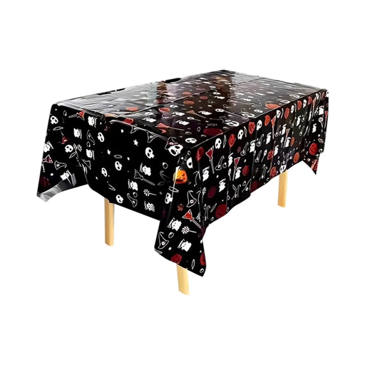 Mantel de Halloween negro con calaveras, fantasmas, calabazas y sombreros de bruja sobre una mesa