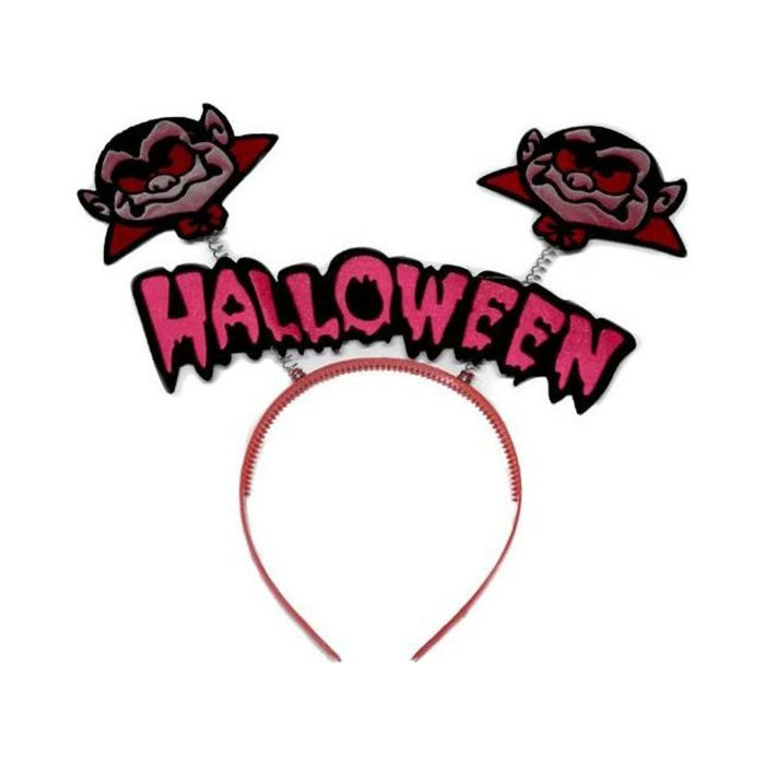 Cintillo de Halloween rojo con dos caras de vampiro en resortes y letrero HALLOWEEN fucsia